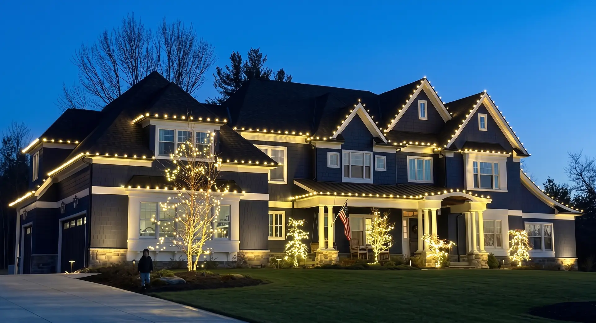 Professional Christmas lights installed along a home's roofline by Be The Light GA