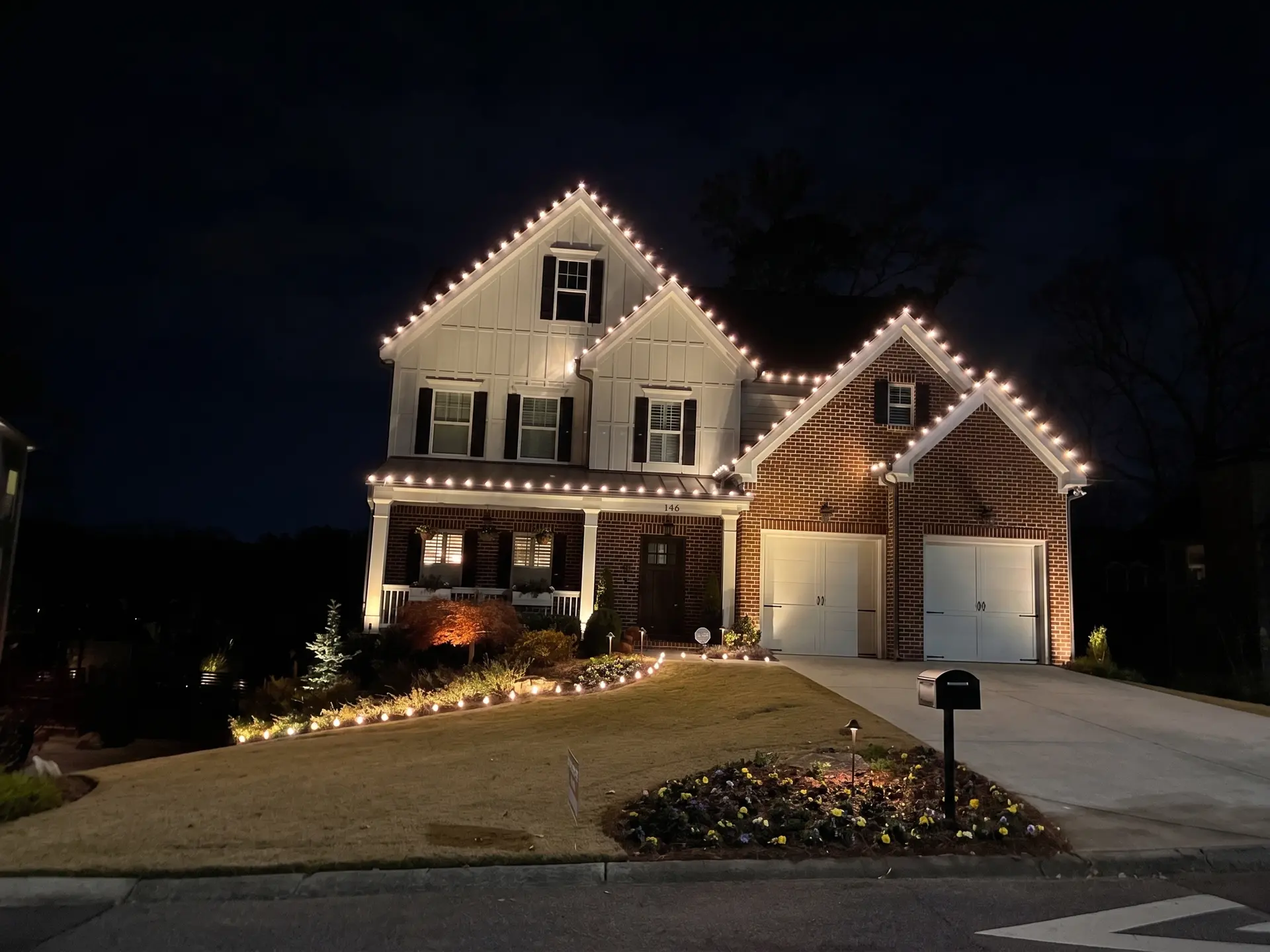 A metro Atlanta home lit up for the holidays by the family team at Be The Light GA